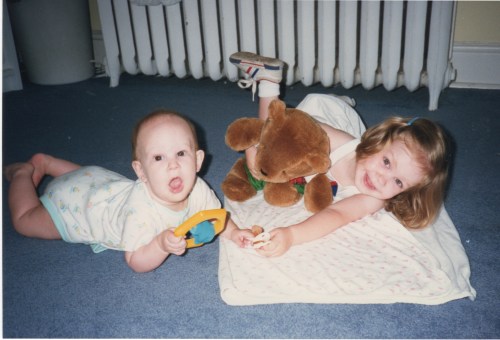 The boy and daughter #1 playing in front of a big ol' radiator.