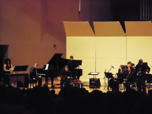 That's Tim playing the guitar in the center of the pic