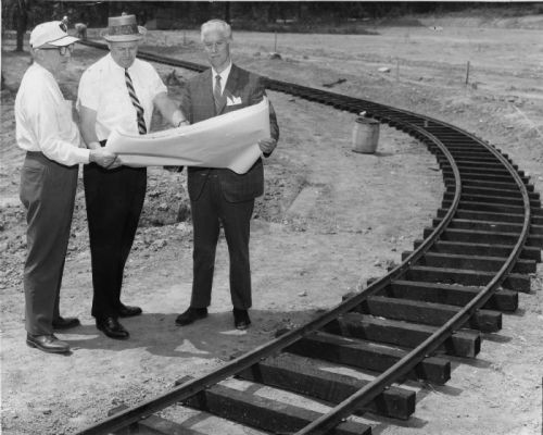 Director Marlin Perkins looks at the plans in 1963.