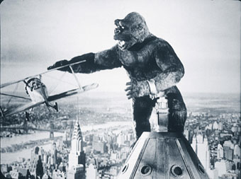 Police aviators doing battle with a big ape in 1933
