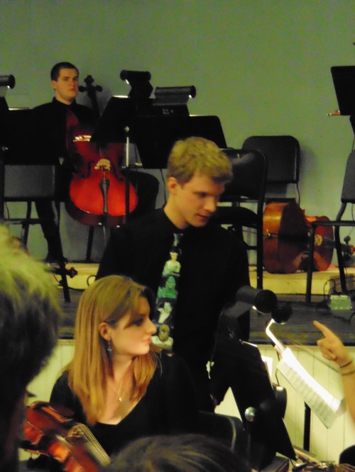 Note the hand pointing on the right: "I dig your tie!"