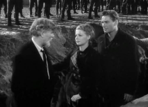 Partisans dig their own graves in "The Edge of Darkness"