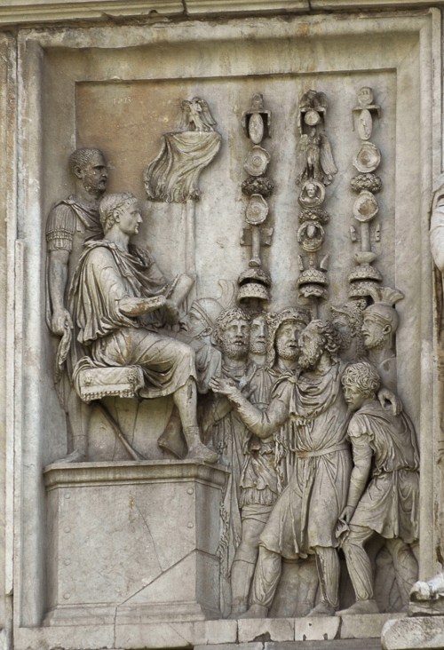 Scene of the emperor’s mercy (clementia). Relief on the north side. Marble. A.D. 175—196. Rome, Arch of Constantin.